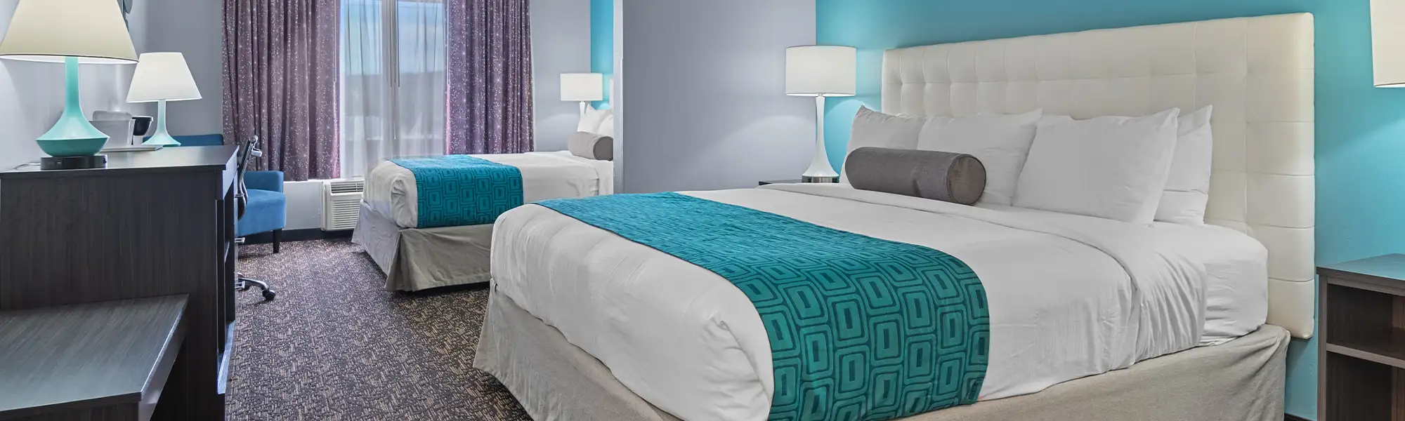 Elevation Inn & Suites room with beds
